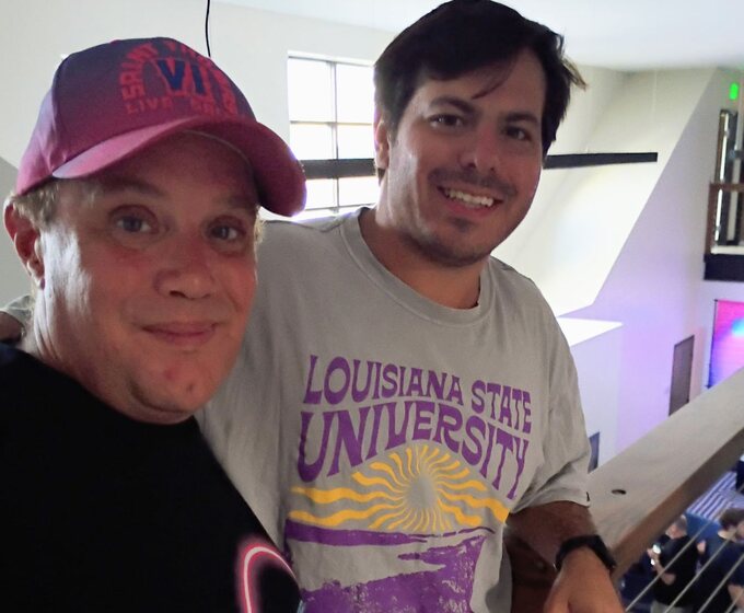 Two attendees smiling at the Sober and Shameless Savannah alumni event