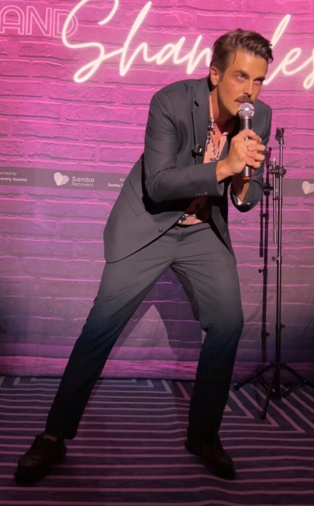 Headliner J. Steinbrunner performing stand-up comedy at Sober and Shameless